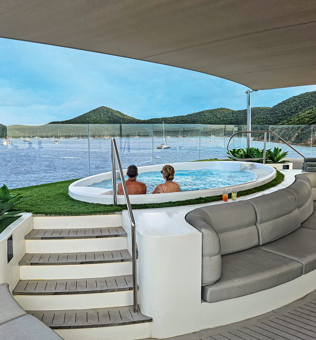 Hot tub on board Emerald yacht looking over sea