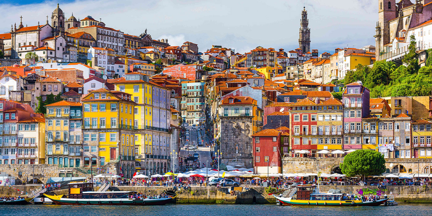 old colorful buildings along the water in Porto